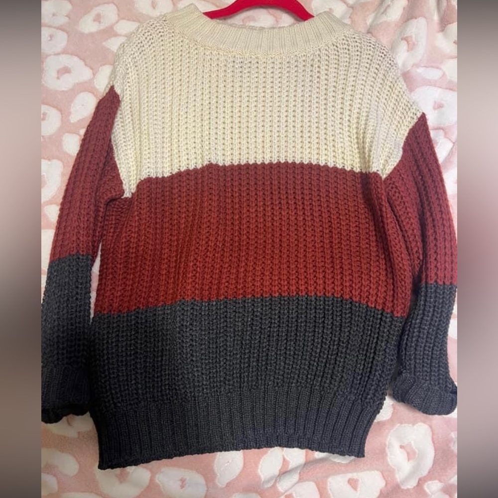 Small boutique sweater